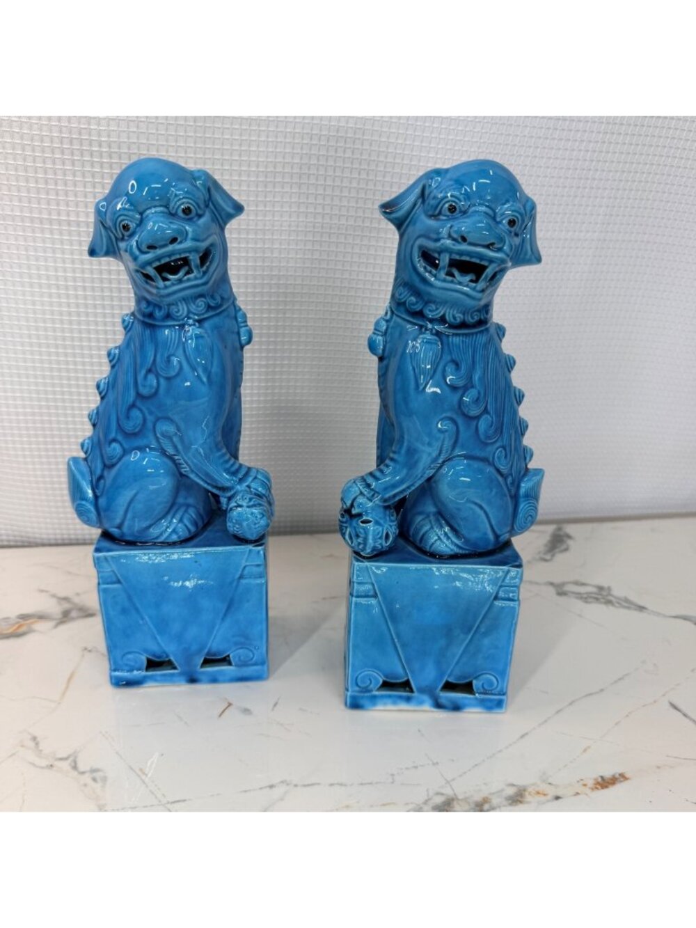 Vintage Chinese porcelain Foo Dog statue finished in a striking turquoise blue g